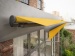 Yellow awning with face fixture