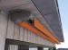 Orange awning with top fixture